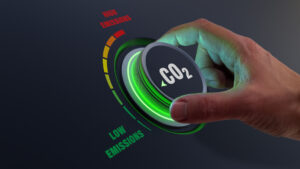 A person turning a dial that says “CO2”.